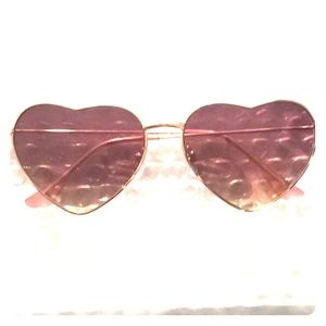 Heart shaped sun glasses